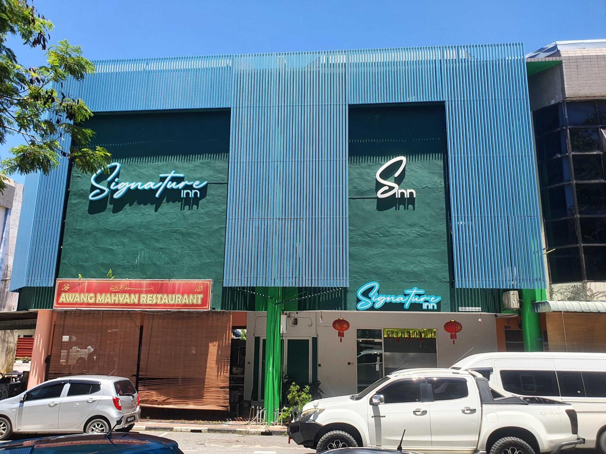 Oyo 91053 Signature Inn Miri Kültér fotó